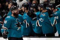 San Jose Sharks' Brent Burns, left, is congratulated for his goal against the Vegas Golden Knig ...