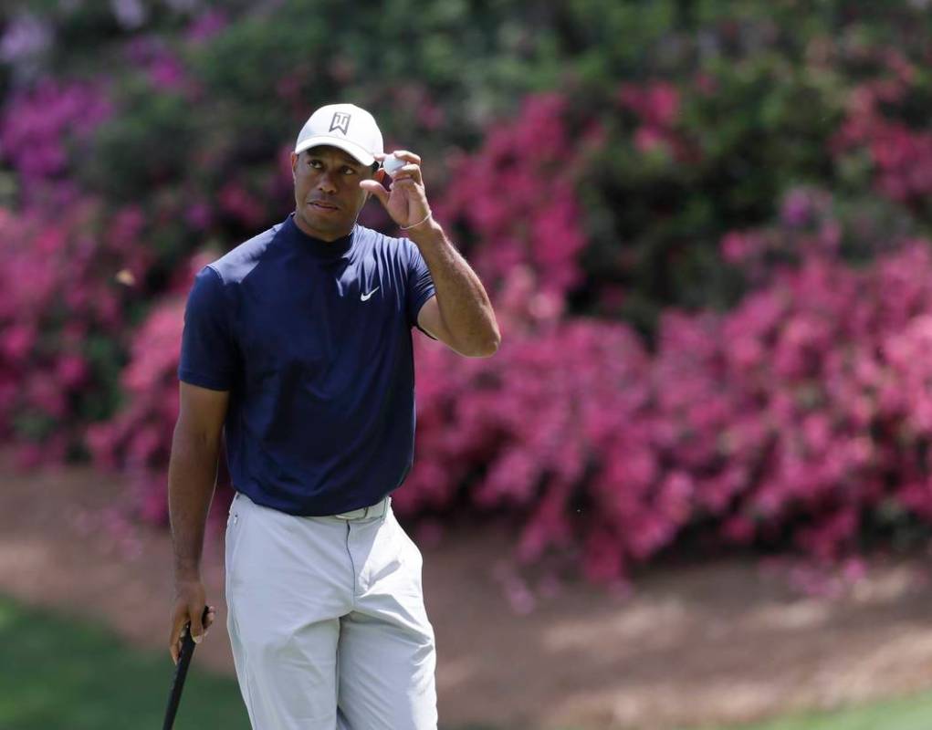 Tiger Woods on the 13th hole during the first round for the Masters golf tournament Thursday, A ...
