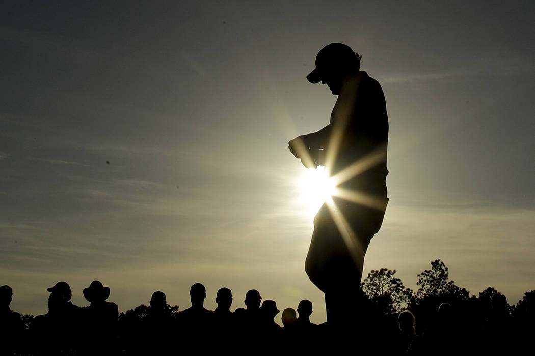 Phil Mickelson walks to the 18th tee during the first round for the Masters golf tournament Thu ...