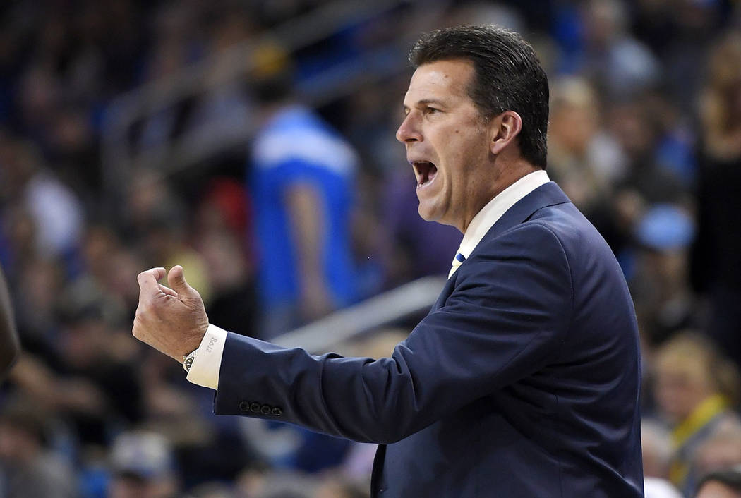 UCLA head coach Steve Alford yells to his team during the first half of an NCAA college basketb ...