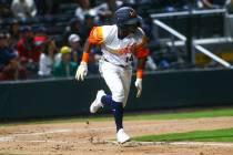 Las Vegas Aviators shortstop Jorge Mateo (14) runs for first base during the first inning of th ...