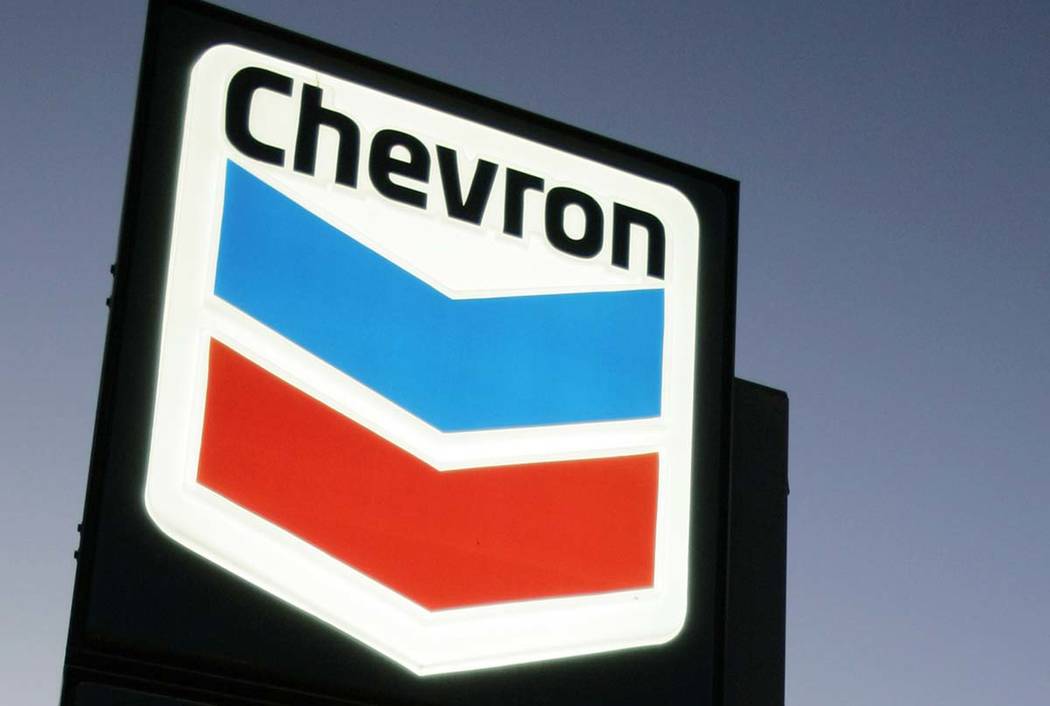 A Chevron gas station service sign on July 25, 2007, in Menlo Park, Calif. Chevron is buying A ...