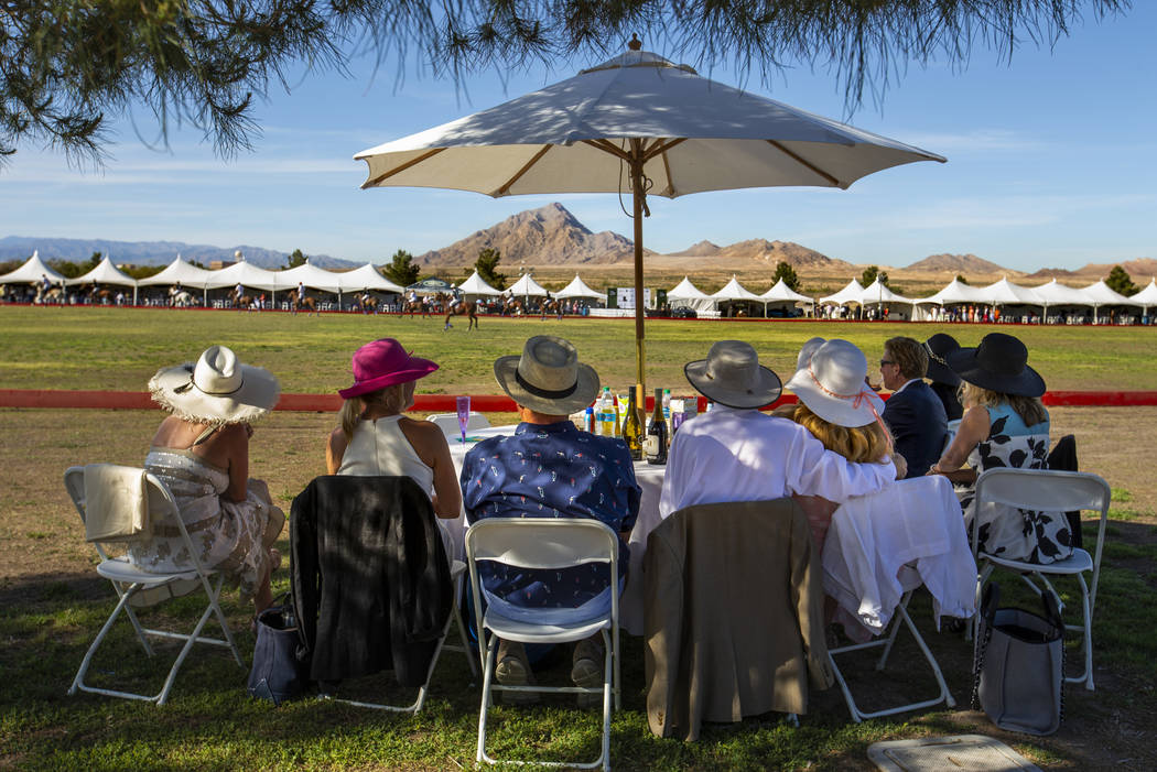 Guests enjoy watching the match during the Las Vegas Polo Classic at Star Nursery Field on Satu ...