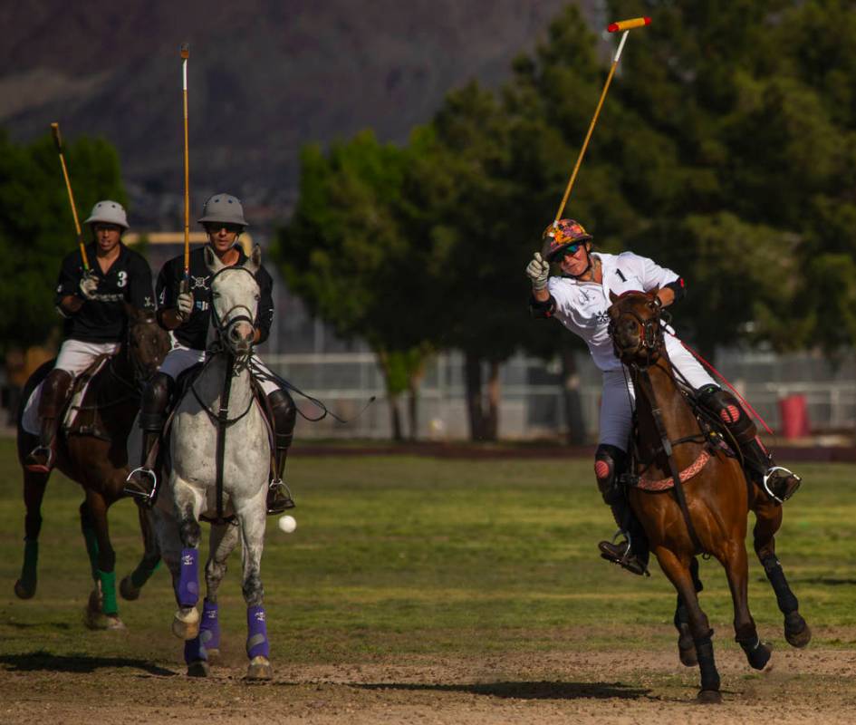 UBS Financial Services Jenny Luttrel-Benardoni (1) drives the ball towards the goal over Blue H ...