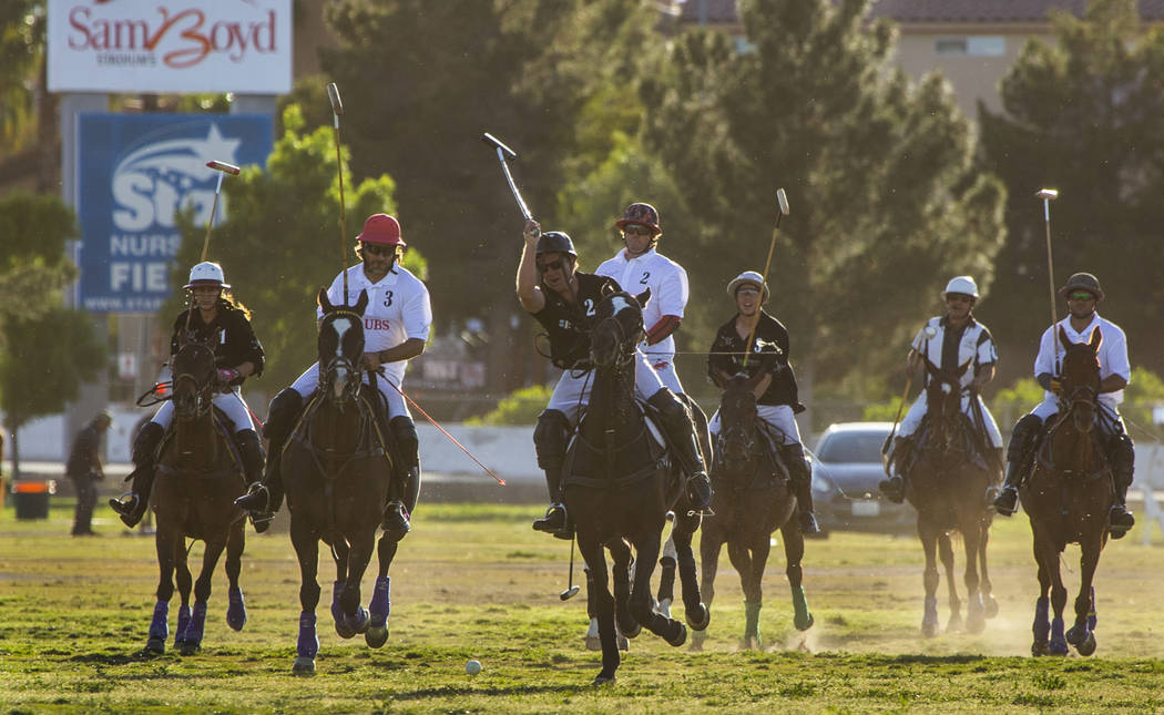 Blue Heron's Dan Faherty (2) sends the ball up the field with the pack following versus UBS Fin ...