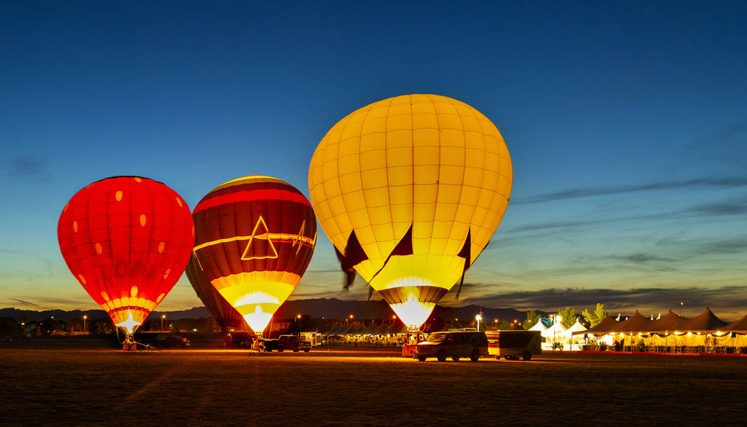 A balloon glow completes the night to live music during the Las Vegas Polo Classic at Star Nurs ...