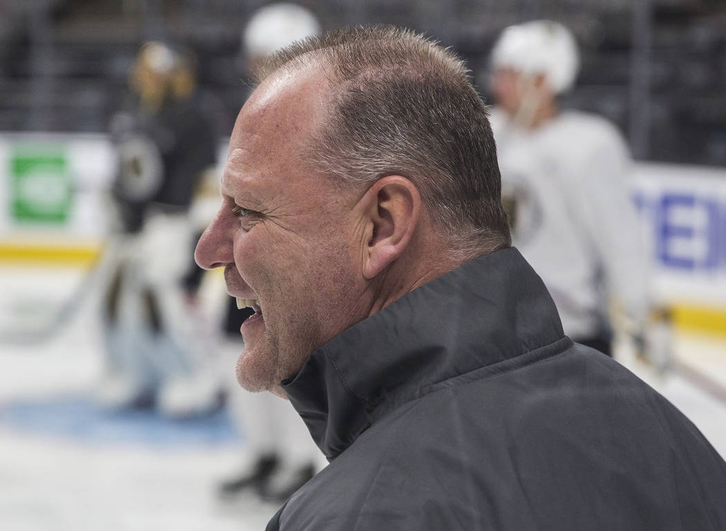 Golden Knights head coach Gerard Gallant keeps his team loose during morning skate on Friday, A ...
