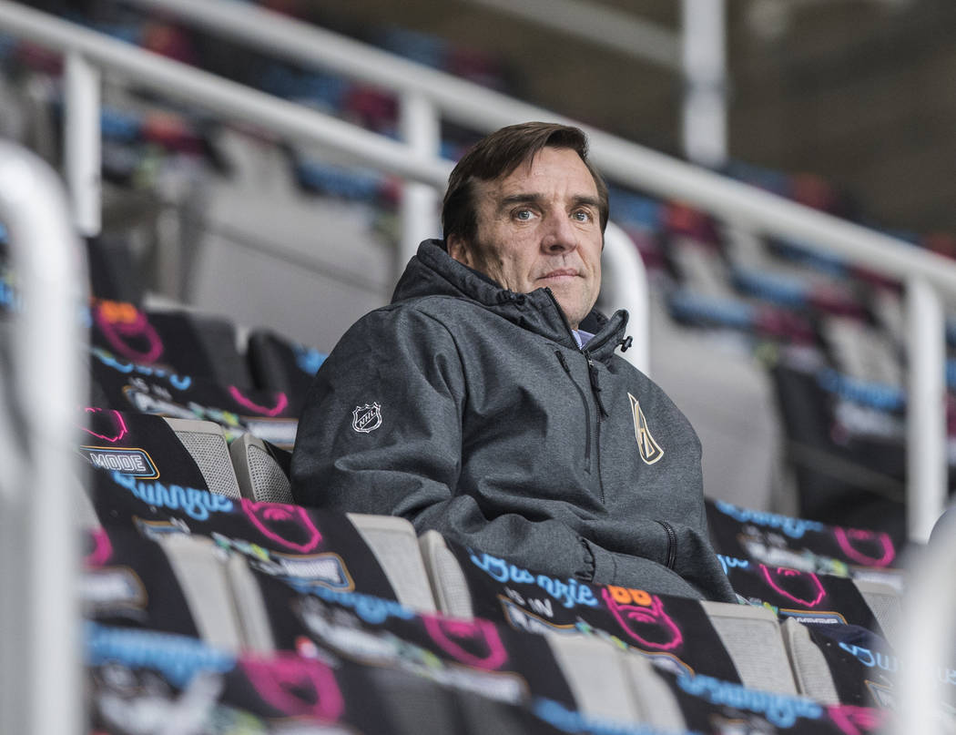 Golden Knights general manager George McPhee watches morning skate on Friday, April 12, 2019, a ...
