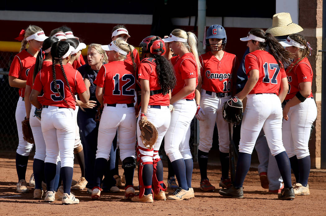 Coronado players, including outfielder Kaila Angel (9) and shortstop Paige Sinicki (12) get ins ...