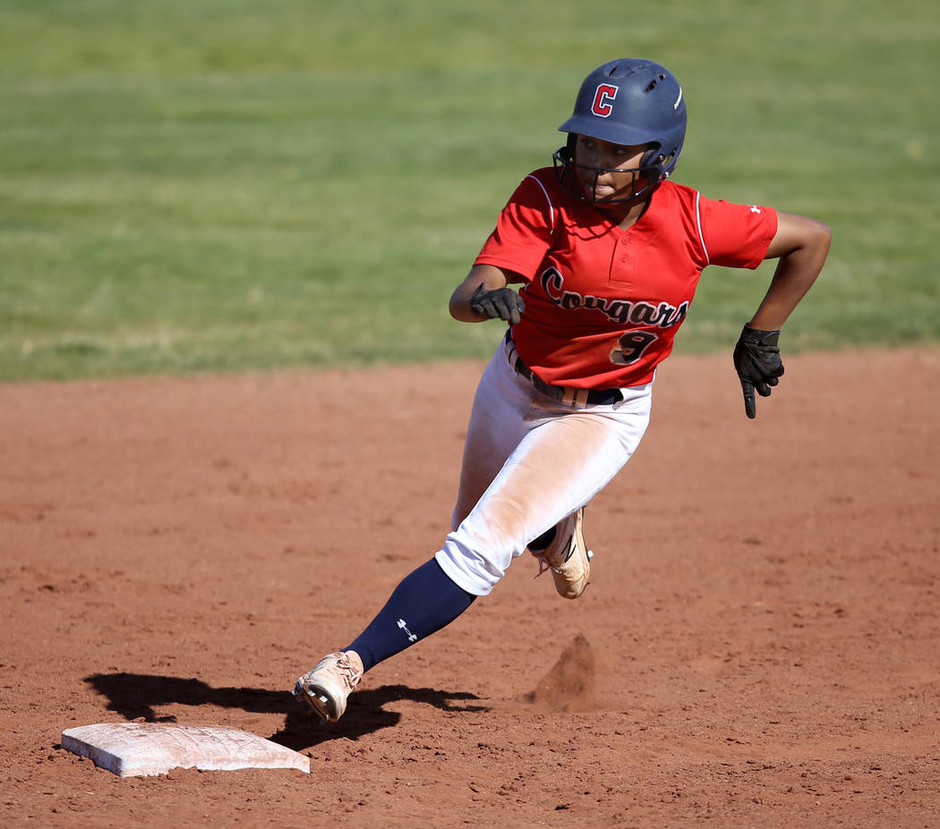 Coronado's Kaila Angel (9) rounds second base after getting a hit off Basic in the third inning ...