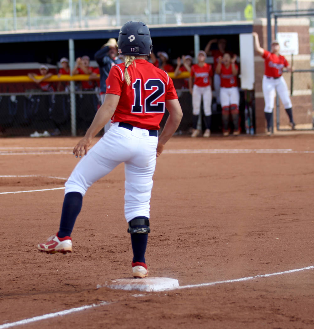 Coronado baserunner Paige Sinicki (12) reacts to her teammates after hitting a triple in the fi ...