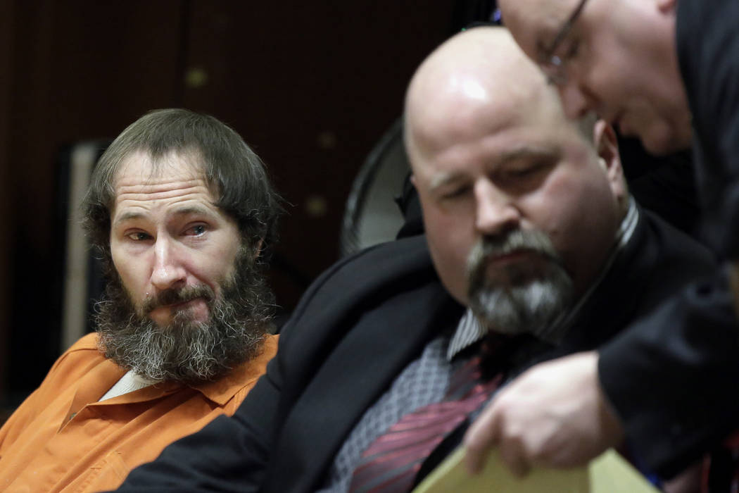 Johnny Bobbitt, left, looks on as his attorney John Keesler and Assistant Prosecutor Andrew McD ...