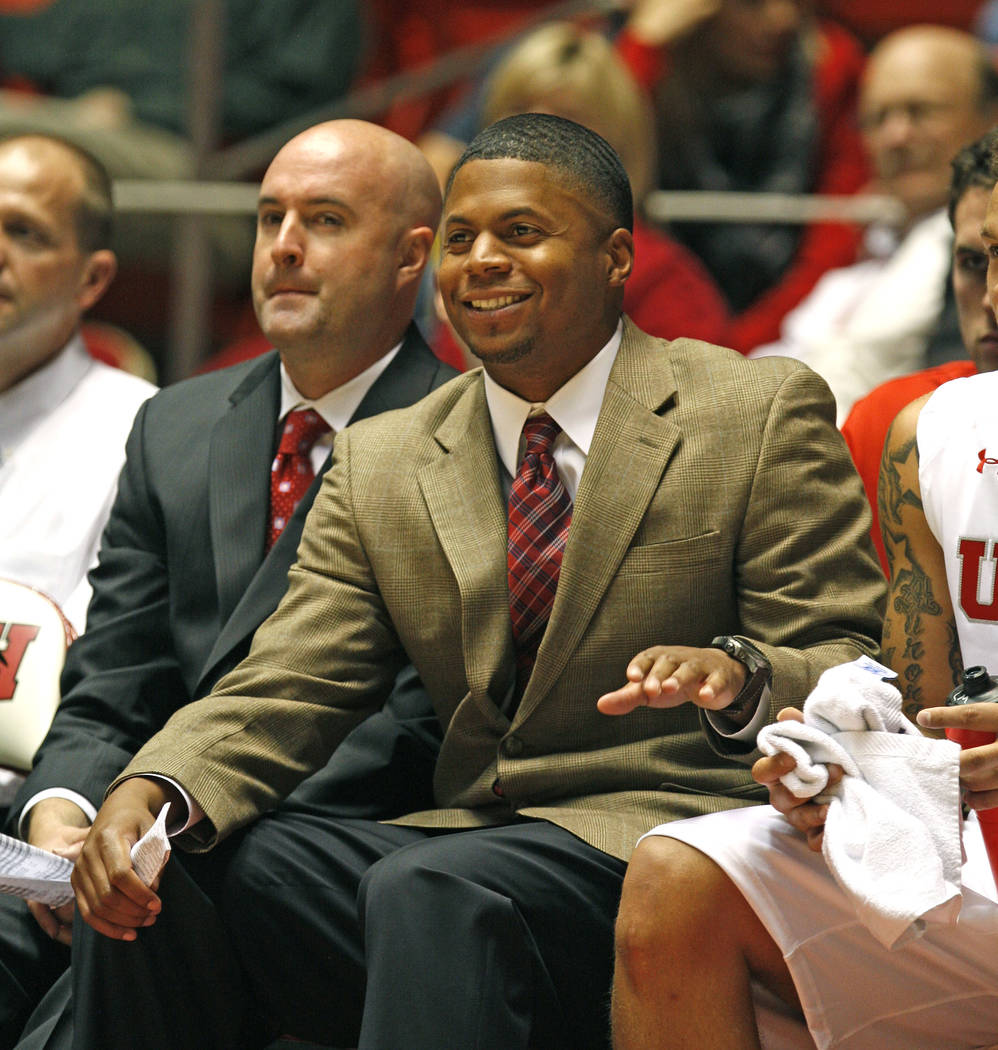 Assistant coach DeMarlo Slocum as the University of Utah men's basketball team defeats Simon Fr ...