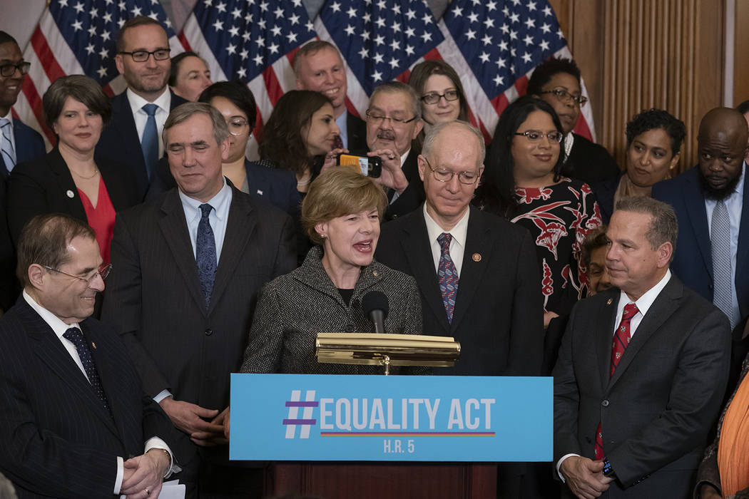 Sen. Tammy Baldwin, D-Wis., flanked by House Judiciary Committee Chairman Jerrold Nadler, D-N.Y ...