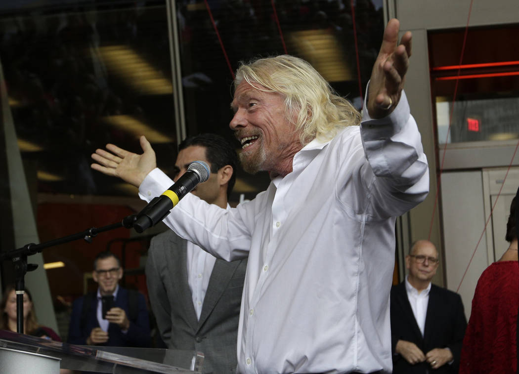 Richard Branson, of Virgin Group, speaks during a naming ceremony for the Brightline train stat ...
