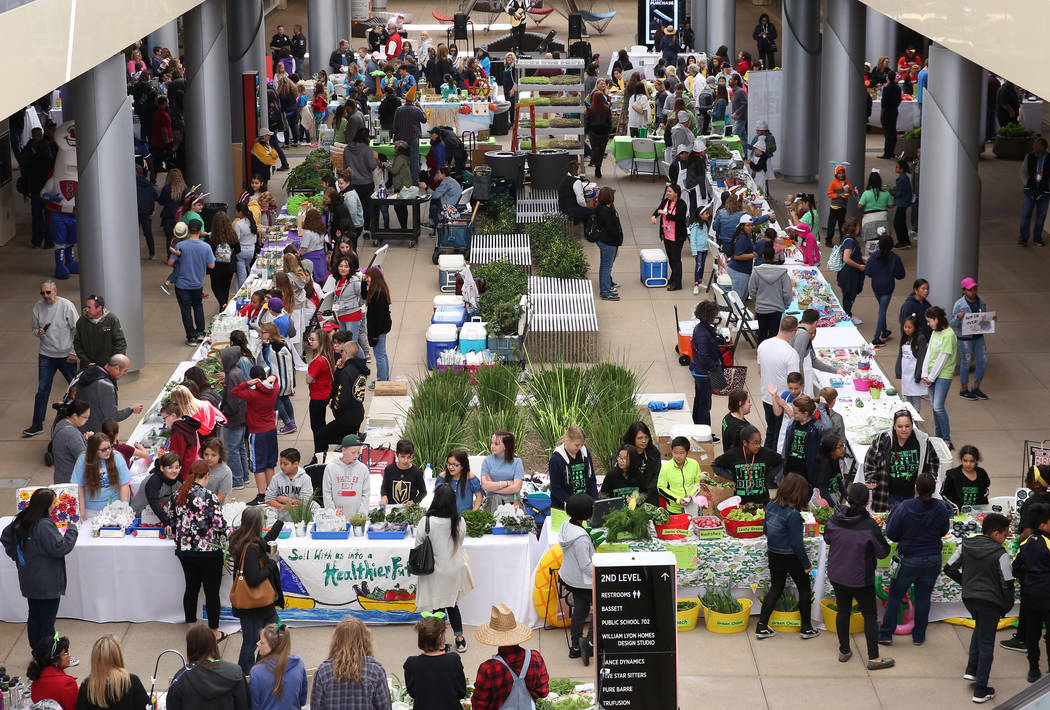 The Clark County School students sale their produce at Green Our Planet's Giant Student Farmers ...
