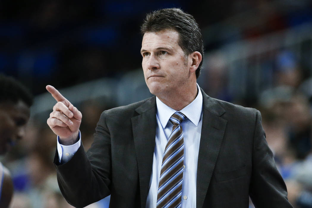 Former UCLA coach Steve Alford gestures during the team's NCAA college basketball game against ...