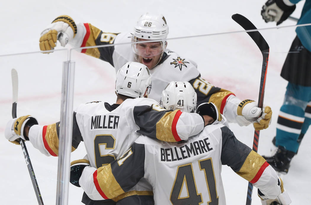 Golden Knights center Pierre-Edouard Bellemare (41) celebrates with teammates Paul Stastny (26) ...