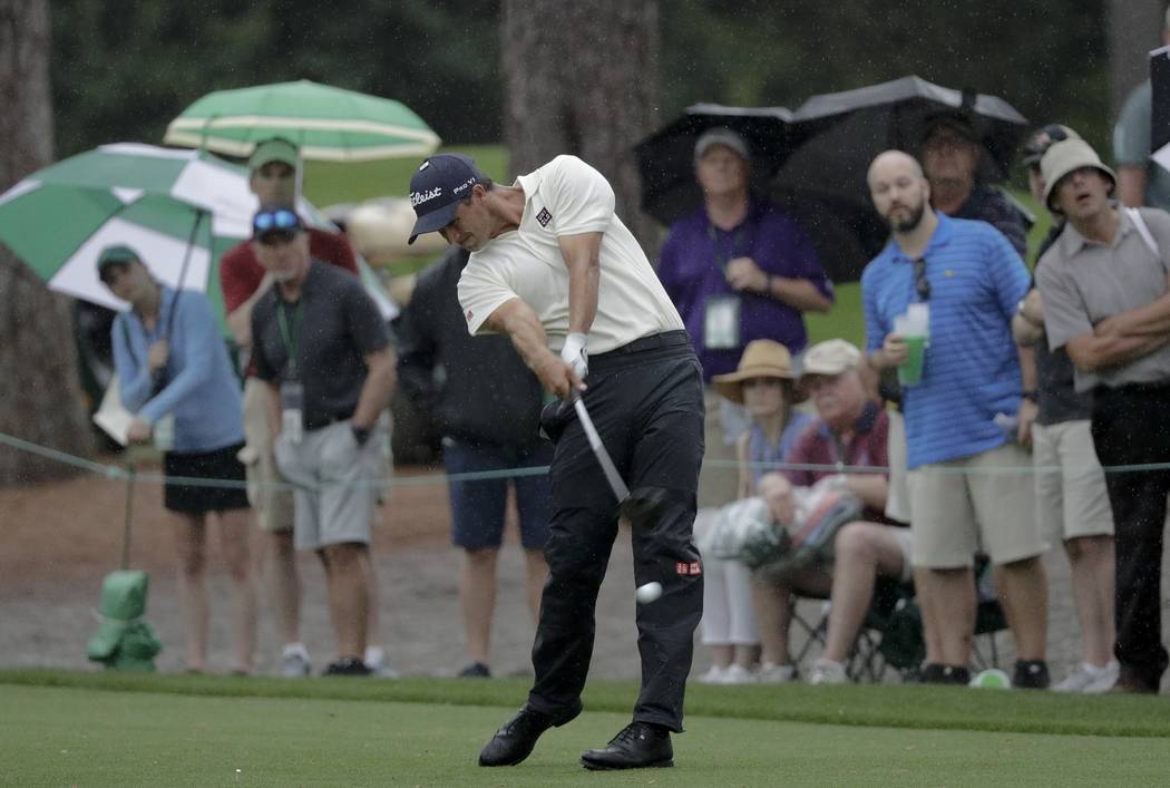 Adam Scott, of Australia, hits a drive on the 17th hole during the second round for the Masters ...
