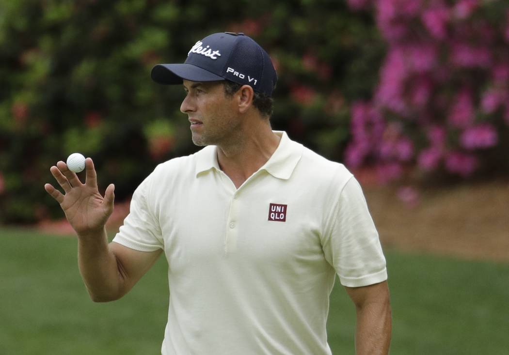Adam Scott, of Australia, waves after his birdie on the 15th hole during the second round for t ...