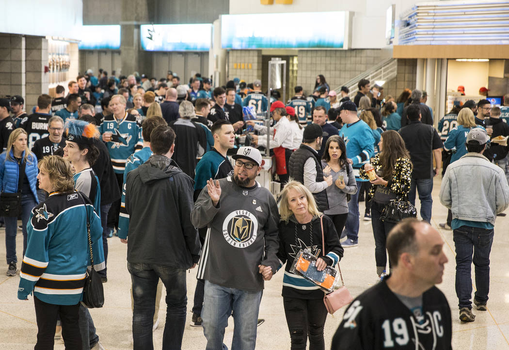 San Jose Sharks fans make their way to their seats before the start of game two of the NHL West ...