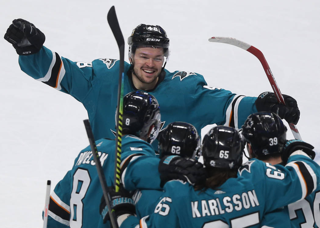 San Jose center Tomas Hertl (48) celebrates with teammates after the Sharks scored a goal in th ...
