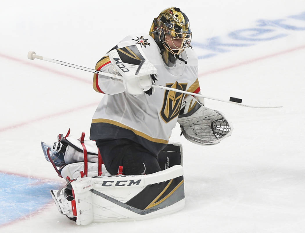 Golden Knights goaltender Marc-Andre Fleury (29) makes a save in the third period during Game 2 ...