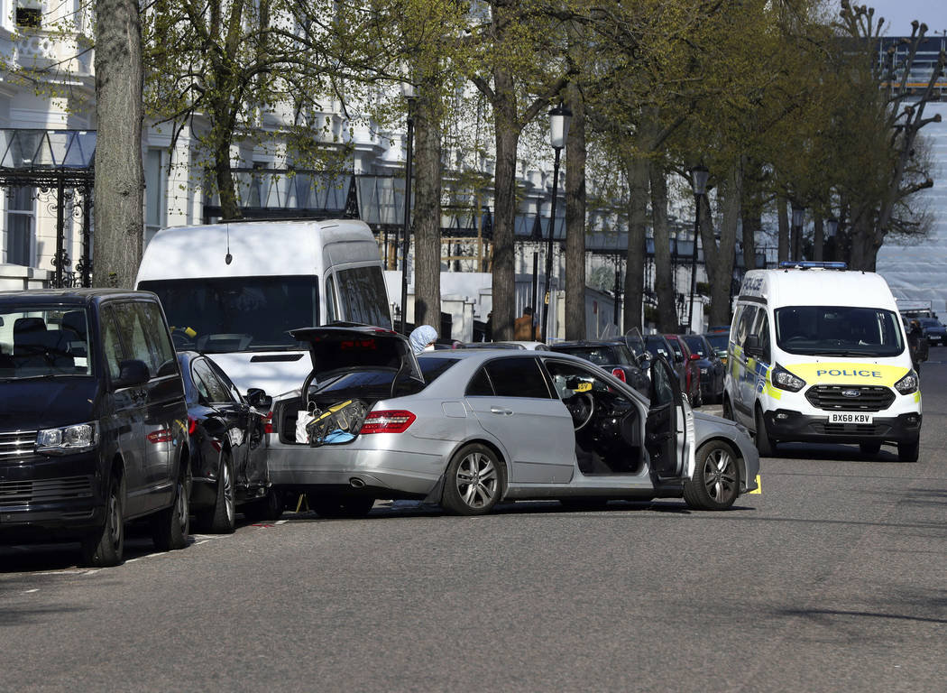 A view of the scene near the Ukrainian Embassy after police fired shots after an incident, in H ...