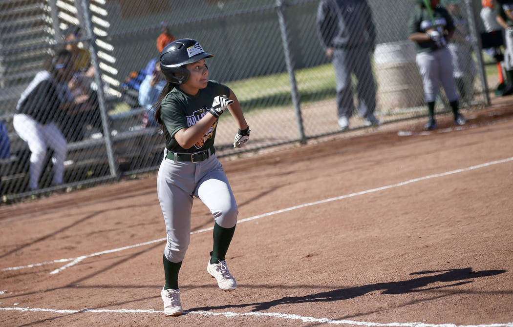 Bulldogs' Karen Guardado, 12, runs to first base while playing against the Rangers during the o ...