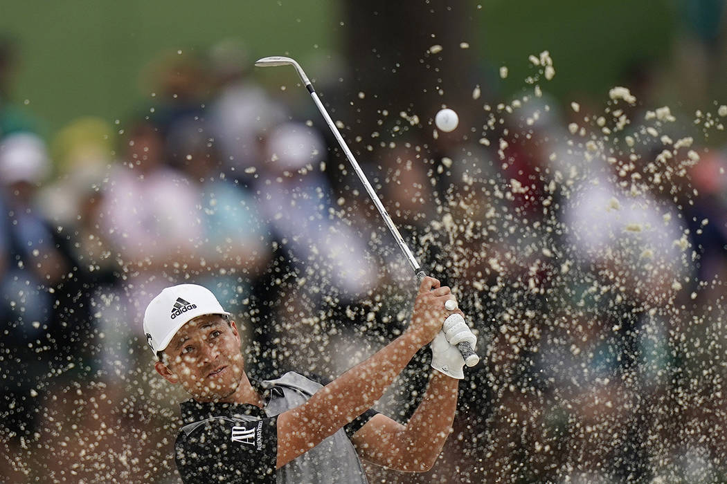 Xander Schauffele hits from a bunker on the seventh hole during the final round for the Masters ...