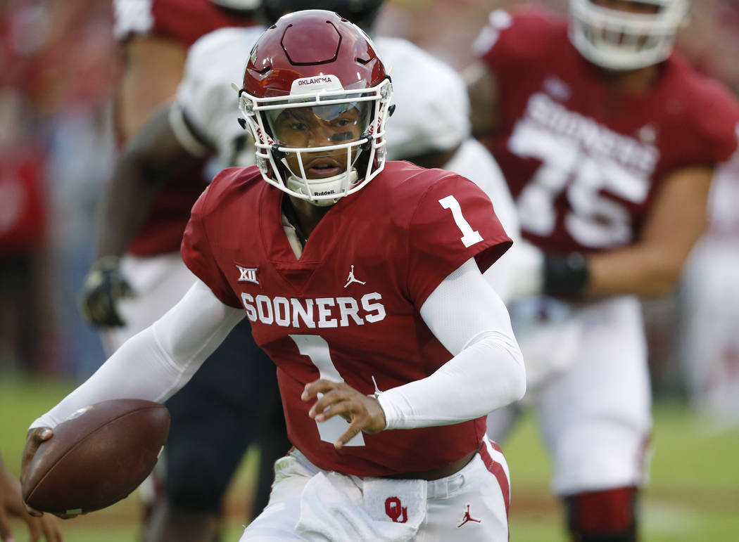 FILE - In this Sept. 22, 2018, file photo, Oklahoma quarterback Kyler Murray (1) carries for a ...