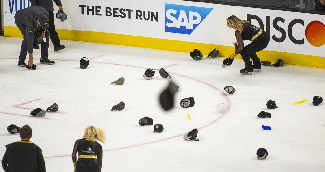 Hats are tossed onto the ice in honor of Golden Knights right wing Mark Stone (61) scoring his ...