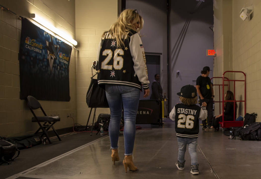 Haley Stastny and Draper,2, make their way outside the arena before the start of Game 3 of an N ...