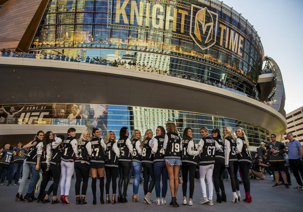 The women of the Golden Knights stand together before the start of Game 3 of an NHL Western Con ...