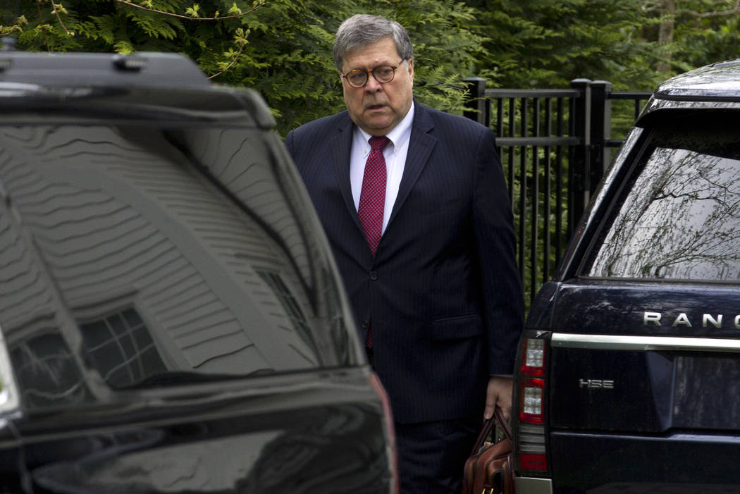 Attorney General William Barr leaves his home in McLean, Va., on Monday, April 15, 2019. Barr t ...