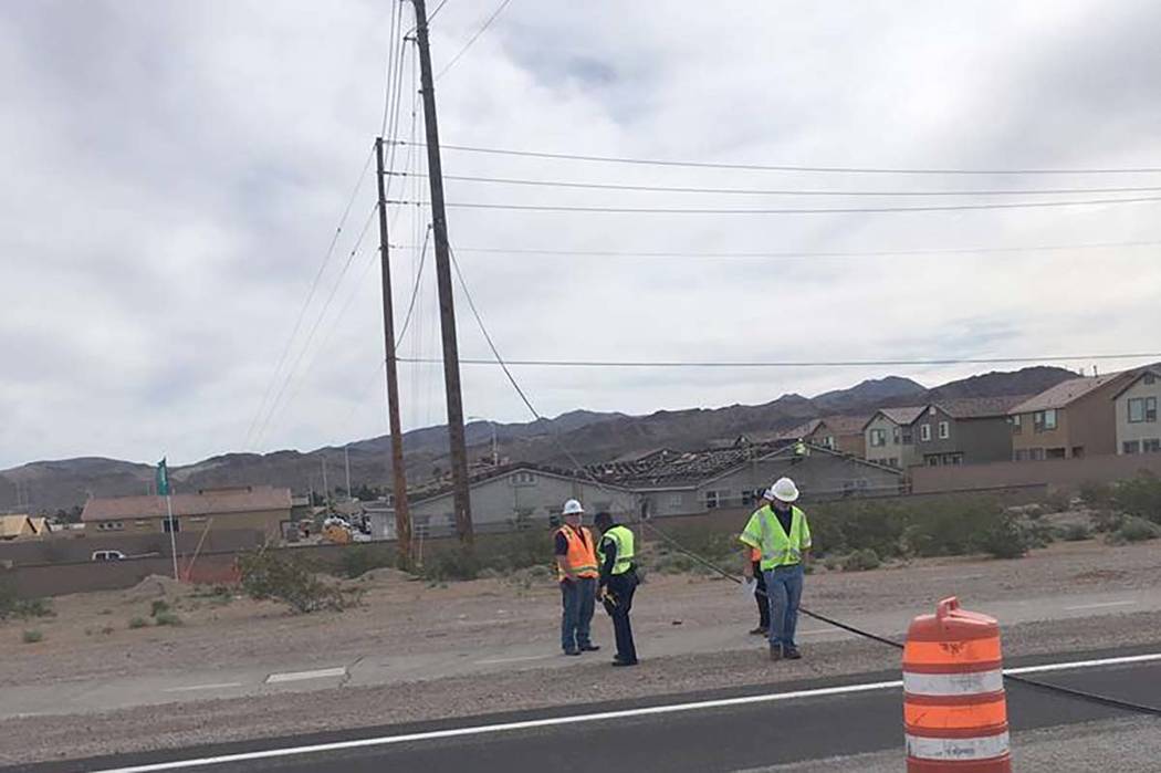 A downed power line on Boulder Highway near Wagonwheel Drive in Henderson has closed the road u ...