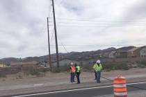 A downed power line on Boulder Highway near Wagonwheel Drive in Henderson has closed the road u ...