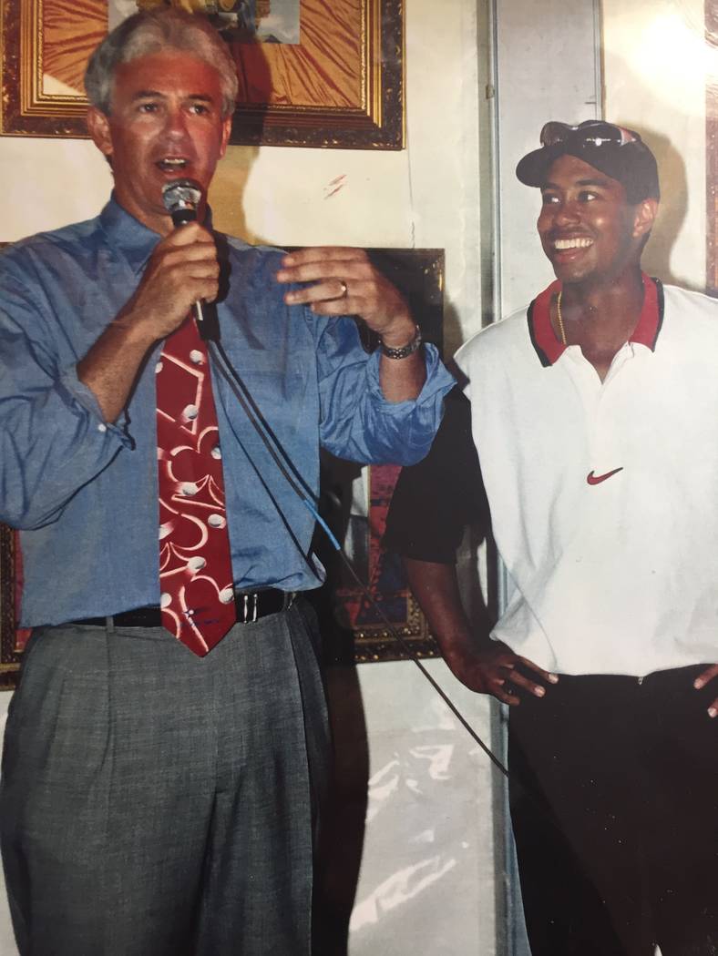 Las Vegas author and avid golfer Jack Sheehan appears with Tiger Woods after Woods' first pro c ...