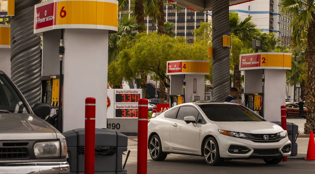 Patrons pump gas at the Shell station on E. Flamingo Road at Koval Lane as gasoline prices jump ...