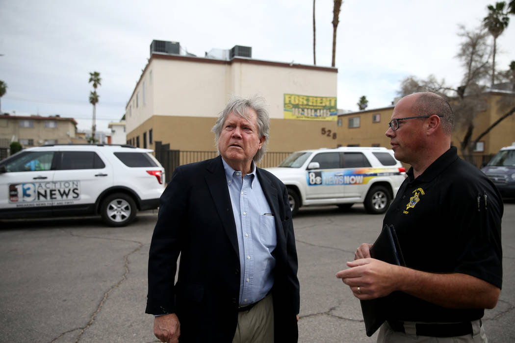 Clark County Commissioner Tick Segerblom, left, and Chief of Code Enforcement Jim Andersen chec ...