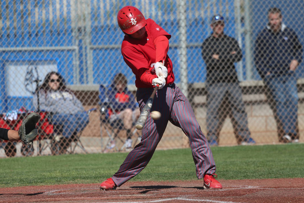 Arbor View's Andrew Hunter (21) connects for a single against Carson in the baseball game at Ce ...