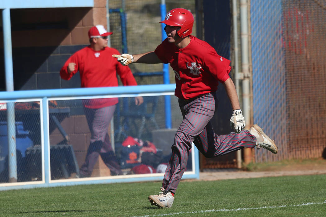 Arbow View's Dillon Jones (10) runs home for a run against Carson in the baseball game at Cente ...