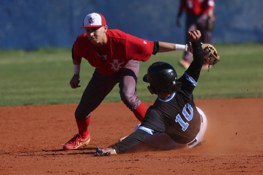 Arbor View's Nicholas Cornman (2) tags out Carson's Steven Franco (10) in the baseball game at ...