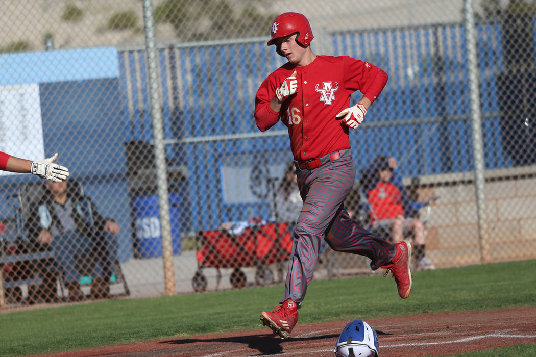 Arbor View's Jacob Scioli (16) runs home for a run against Carson in the baseball game at Cente ...