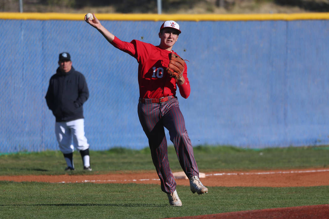 Arbor View's Dillon Jones (10) throws to first base for an out against Carson in the baseball g ...