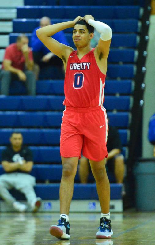 Liberty's Julian Strawther (0) reacts to a foul call in the fourth quarter of a game between Li ...