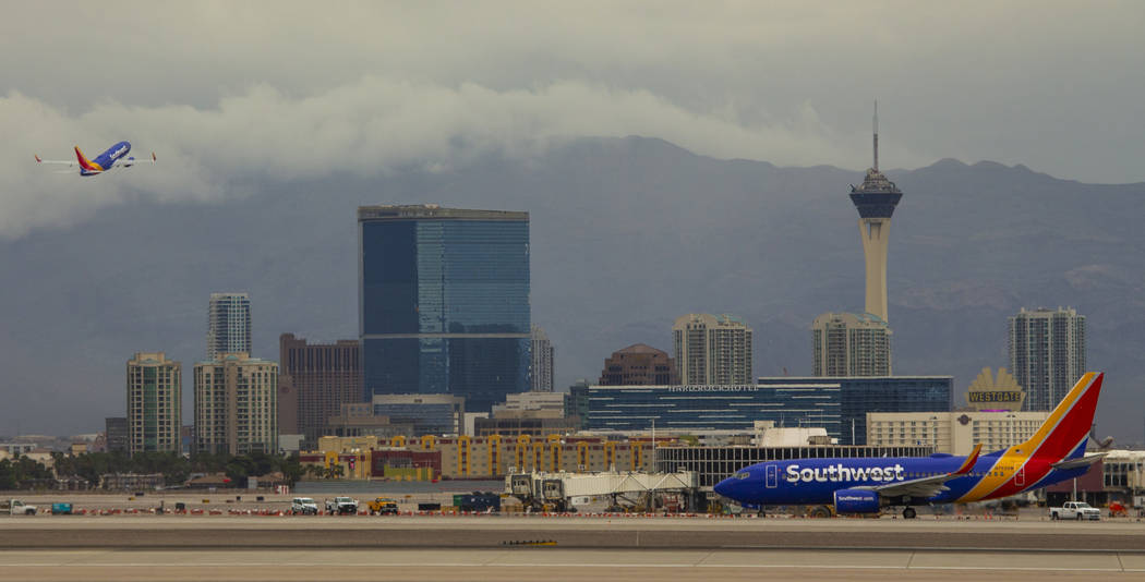 Planes takeoff and taxi at McCarran International Airport on Tuesday, April 16, 2019, in Las Ve ...