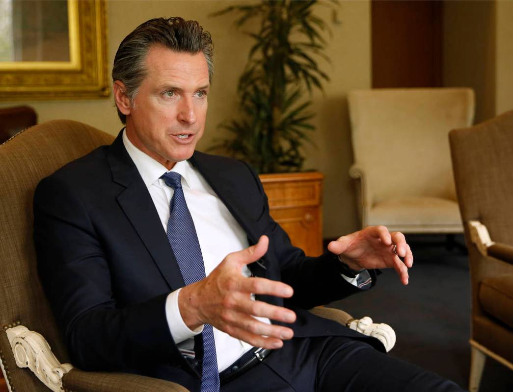 Gov. Gavin Newsom speaks during an interview with The Associated Press, Monday, April 15, 2019, ...