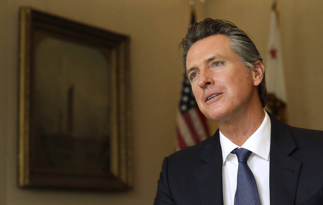 Gov. Gavin Newsom speaks during an interview with The Associated Press, Monday, April 15, 2019, ...