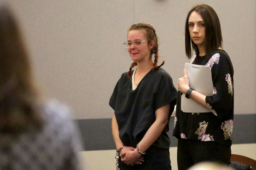 Amy Taylor, left, who stands accused of murder and child abuse with ex-NFL player Cierre Wood, ...